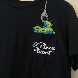 Toy story alien inside pocket.